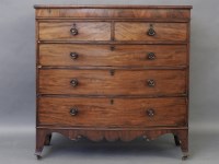 Lot 1667 - An early 19th century bow fronted chest