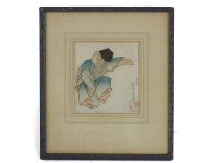 Lot 1569 - A late 19th century Japanese woodblock study of a monkey dressed in a Kimono