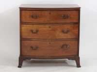 Lot 1730 - A George lll mahogany bow fronted chest of three long drawers on swept feet