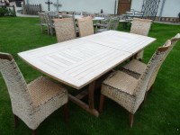 Lot 3102 - A teak extending garden table