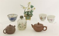 Lot 357 - A pair of famille rose tea cups