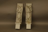 Lot 1518 - A pair of carved marble elements in the form of angels