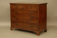 Lot 2143 - A George III mahogany chest of two short and three long drawers