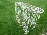 Lot 3143 - A Regency style white painted wire work plant stand