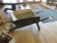 Lot 3148 - A Victorian green painted wooden wheelbarrow