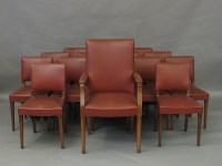 Lot 2159 - A set of fifteen red leather upholstered dining chairs