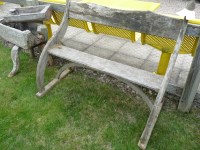 Lot 3071 - A Liberty style Arts & Crafts garden seat