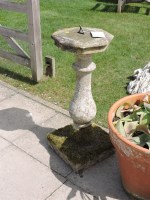 Lot 3117 - A small reconstituted stone sundial of baluster form