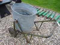 Lot 3138 - A mid 20th century galvanised and iron framed water trundler