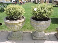 Lot 3139 - A pair of large cast stone planters of half round form