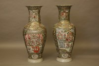 Lot 1528 - A pair of modern famille rose Chinese vases