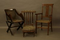 Lot 2094 - An oak Glastonbury chair