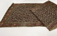 Lot 2216 - A North West Persian carpet