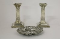 Lot 1092 - A pair of silver Corinthian column candlesticks