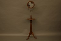 Lot 2129 - A Victorian circular mahogany shaving mirror table