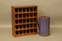 Lot 2084 - A contemporary stained pine wine rack