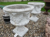 Lot 3060 - A pair of 20th century white painted cast stone  planters