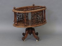 Lot 1673 - A Victorian burr walnut canterbury