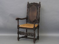 Lot 1806 - Carolean style carved oak armchair