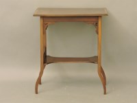 Lot 443 - An Edwardian crossbanded mahogany occasional low table