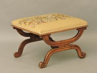 Lot 404 - An early Victorian mahogany 'x' frame stool