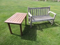 Lot 3161 - A teak garden seat