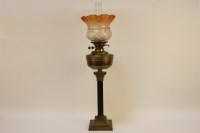 Lot 1570 - A Corinthian column oil lamp