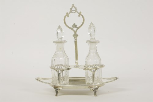 Lot 118 - A silver double bottle stand