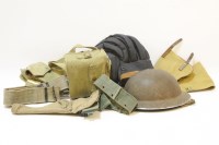 Lot 301 - A military issue tank helmet