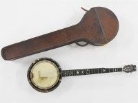 Lot 373 - A banjo with mother of pearl inlaid fret board and rim