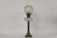 Lot 242 - Various items: a silver plated oil lamp
