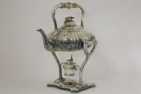 Lot 138A - A silver plated kettle on stand