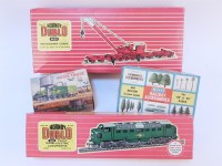 Lot 253 - Two boxes of vintage Hornby Dublo model trains and accessories