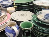 Lot 228 - A large quantity of 19th century green glazed leaf moulded plates