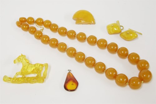 Lot 56 - A single row graduated amber bead necklace