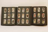 Lot 146 - Two albums of players cigarette cards