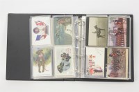 Lot 101 - A postcard album with 220 military cards