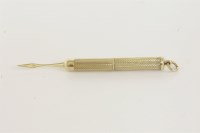 Lot 22 - A 9ct gold tooth pick