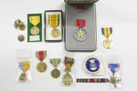Lot 97 - Nine various  US medals and two badges