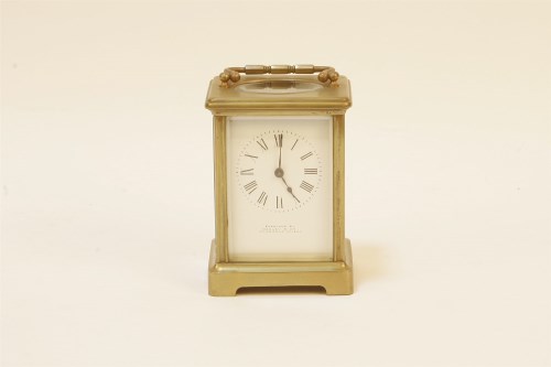 Lot 126 - A brass carriage clock