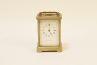 Lot 126 - A brass carriage clock