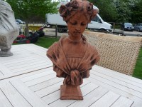 Lot 3042 - A terracotta cast bust of a young girl in Art Nouveau style