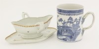 Lot 75 - A Chinese export blue and white tankard
