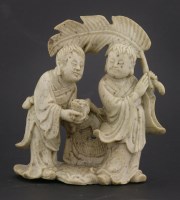Lot 112 - A steatite group of the Twin Spirits of Mirth and Harmony