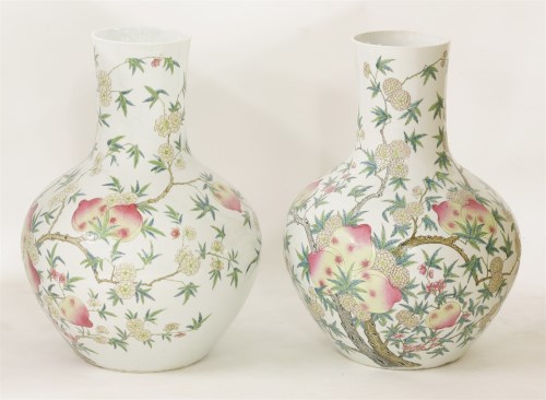 Lot 84 - An impressive matched pair of famille rose vases