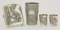 Lot 161 - Four pieces of Chinese dragon-decorated trade silver