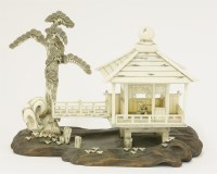 Lot 273 - A Japanese ivory okimono