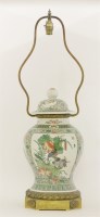 Lot 82 - A famille verte vase and cover