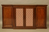 Lot 2011 - A large mahogany breakfront cabinet