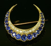 Lot 330 - A late Victorian sapphire and diamond closed crescent brooch